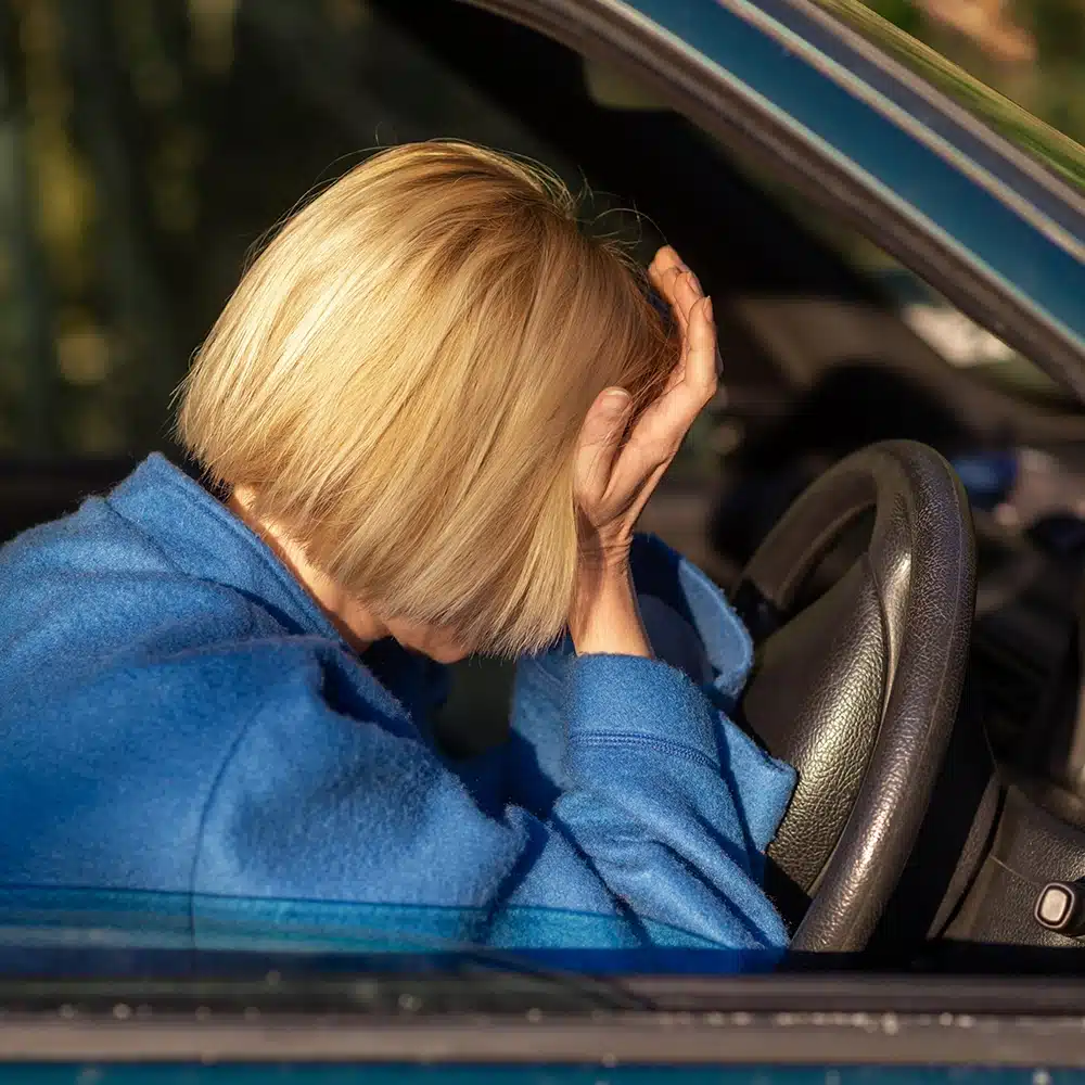 Anxious female driver behind the wheel - Returning Drivers Courses for drivers on the Gold Coast Qld